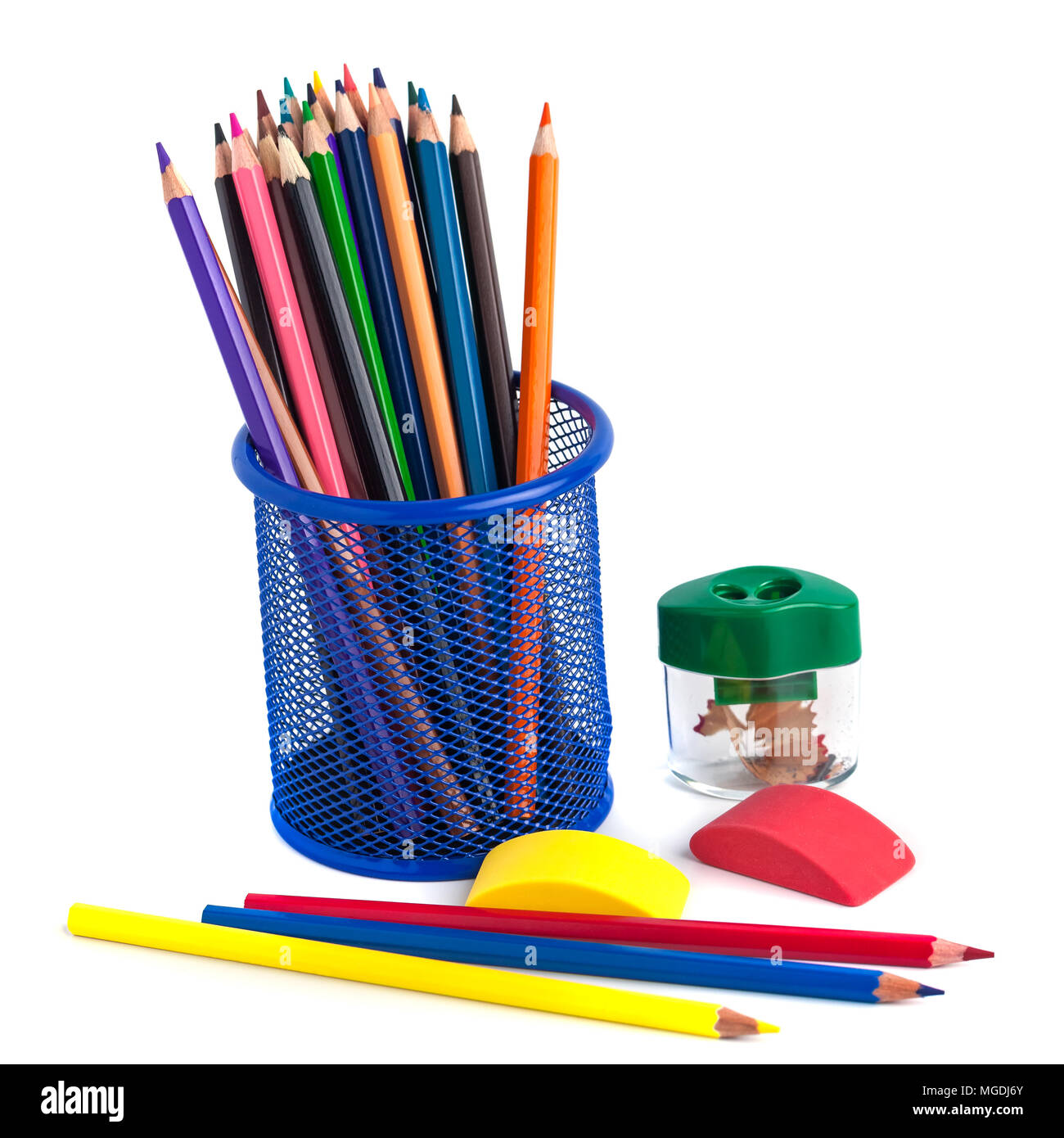 colored pencils in the basket, Eraser and pencil sharpener on white