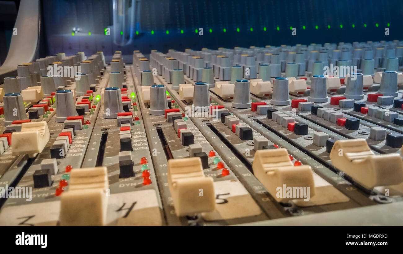 Professional audio mixing console with faders in recording studio Stock ...