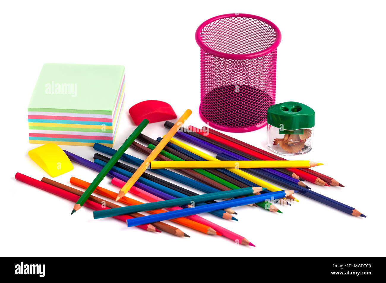 Top view of colored pencils with shavings and pencil sharpener over white  background. top view Stock Photo - Alamy