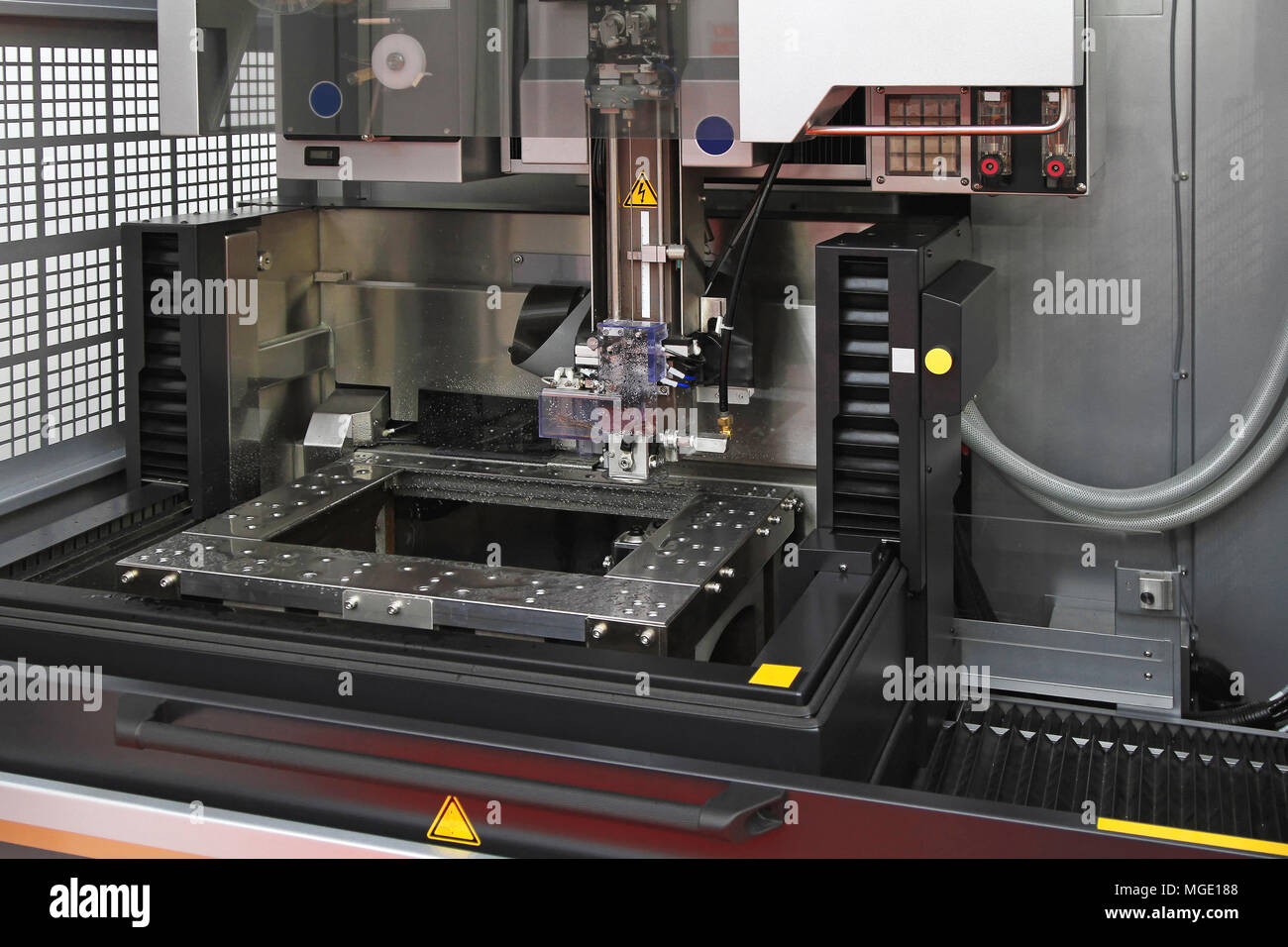 Electrical discharge machine spark eroding with wire Stock Photo Alamy