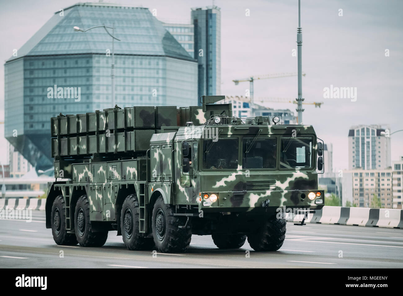 Minsk, Belarus. Soviet Heavy Multiple Rocket Launcher Polonez Moving Near National Library During Rehearsal Before Celebration Of The National Holiday Stock Photo