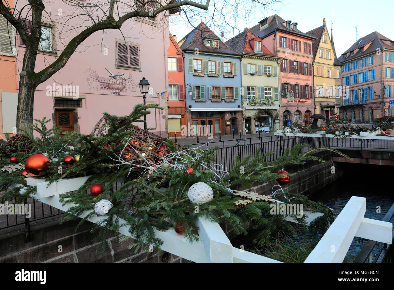 Christmas Decorations on Shops and timber framed houses, Colmar town, Alsatian wine area, Alsace, France, Europe Stock Photo