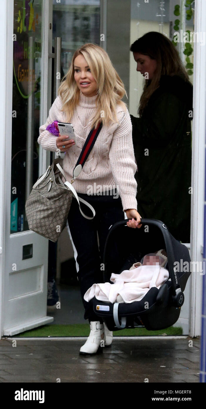 Katie Piper out shopping with her baby daughter Penelope on a rainy day in  Brentwood Featuring: