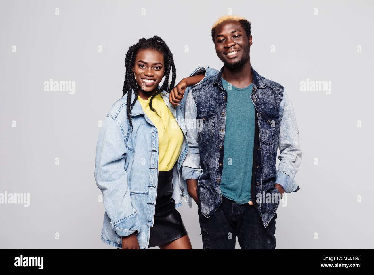 Afro american couple in casual clothes smiling at camera on white Stock ...