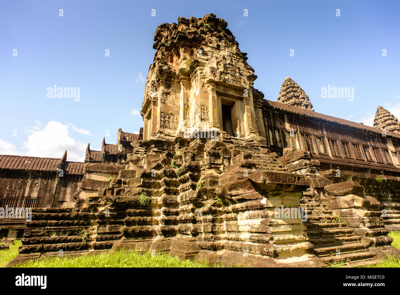 Wall of the Angkor Wat (Temple City), a Buddhist temple complex in Cambodia and the largest religious monument in the world. View from the garden Stock Photo