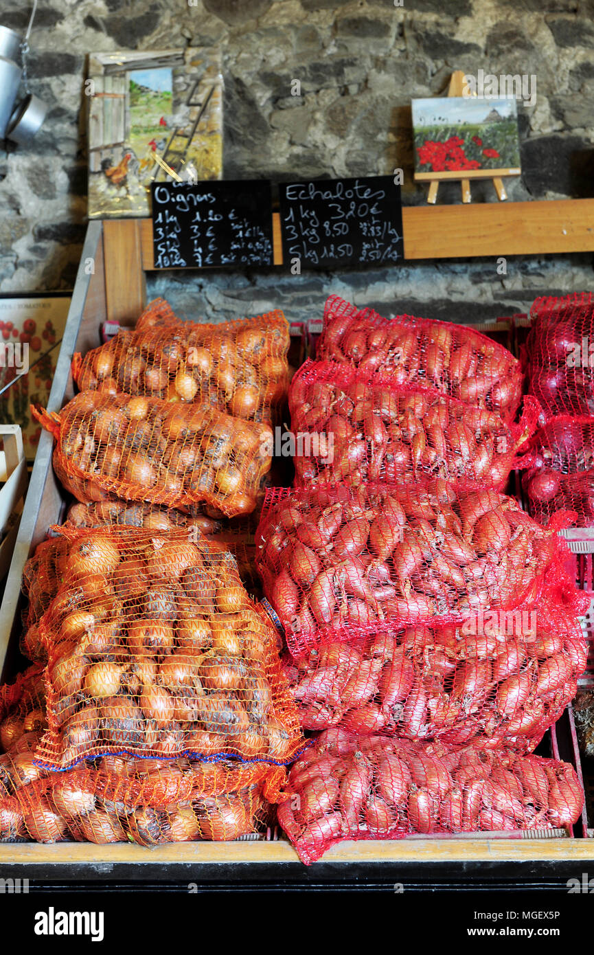 French shallots for sale at La Ferme des Beaux Bois, a local producer in the town of Cherrueix, Brittany, France Stock Photo