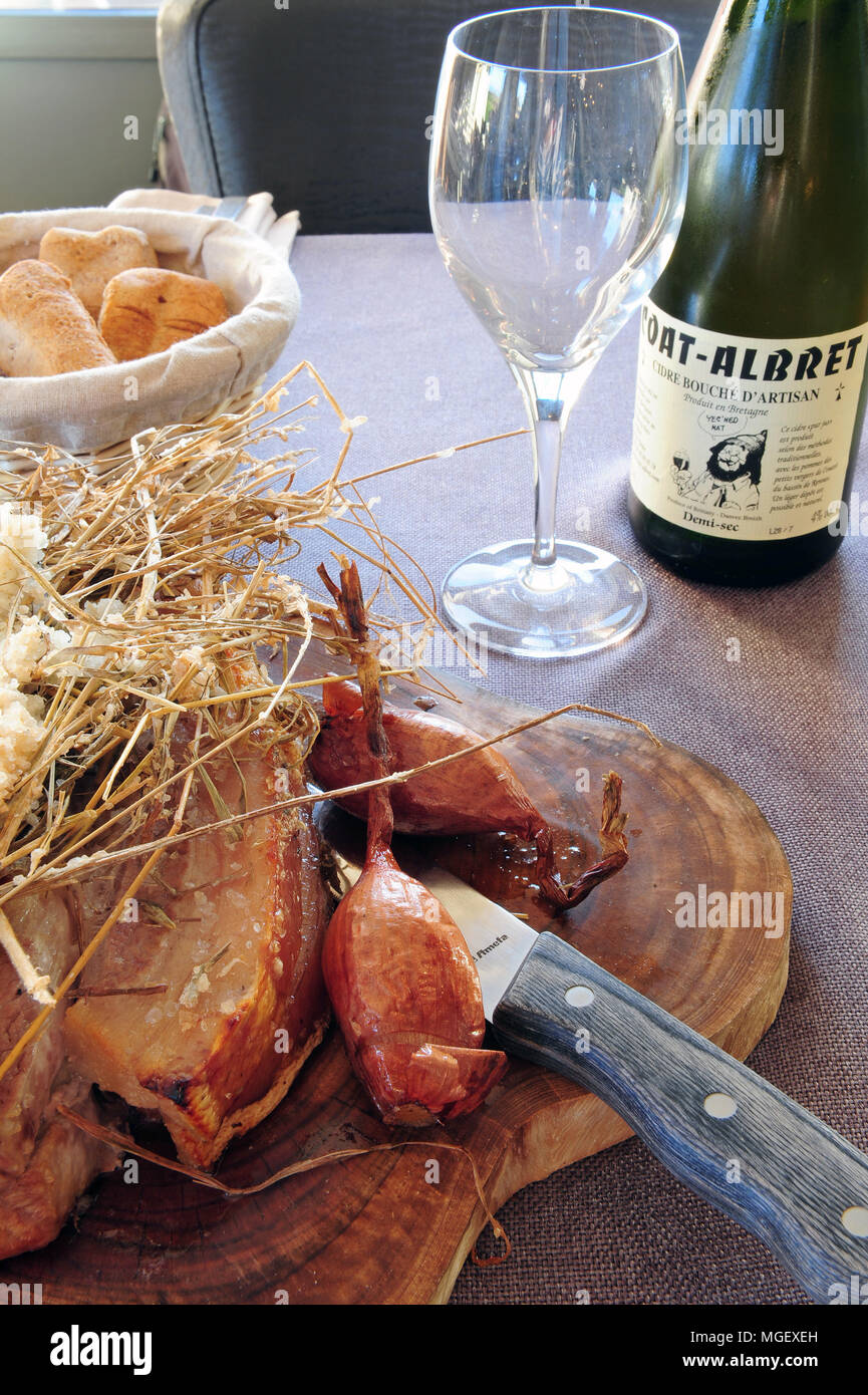 Caramelised pork chop with Cherrueix shallots from La Table du Marais restaurant, La Fresnais, Brittany, France Stock Photo