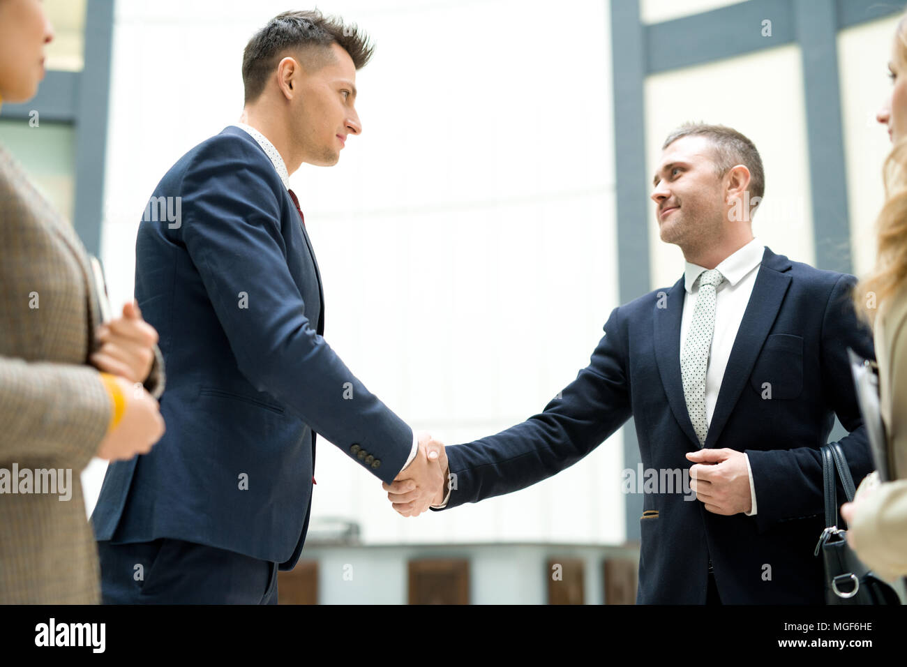 Group of businessmen suits hi-res stock photography and images - Alamy