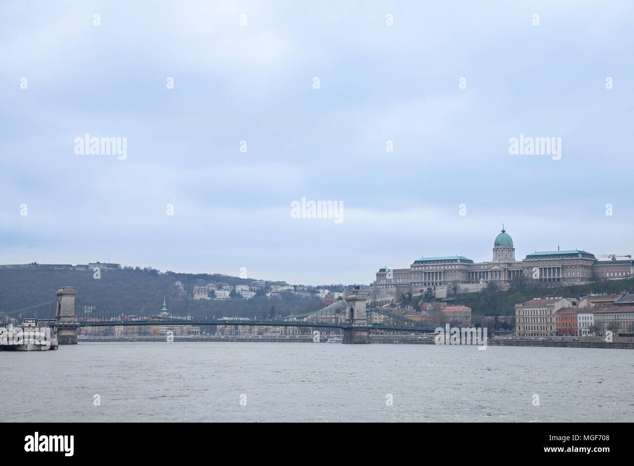 Buda Castle seen from Pest with the Danube and Szechenyi Chain Bridge in front.  The cast is the historical palace complex of the Hungarian kings   Pi Stock Photo