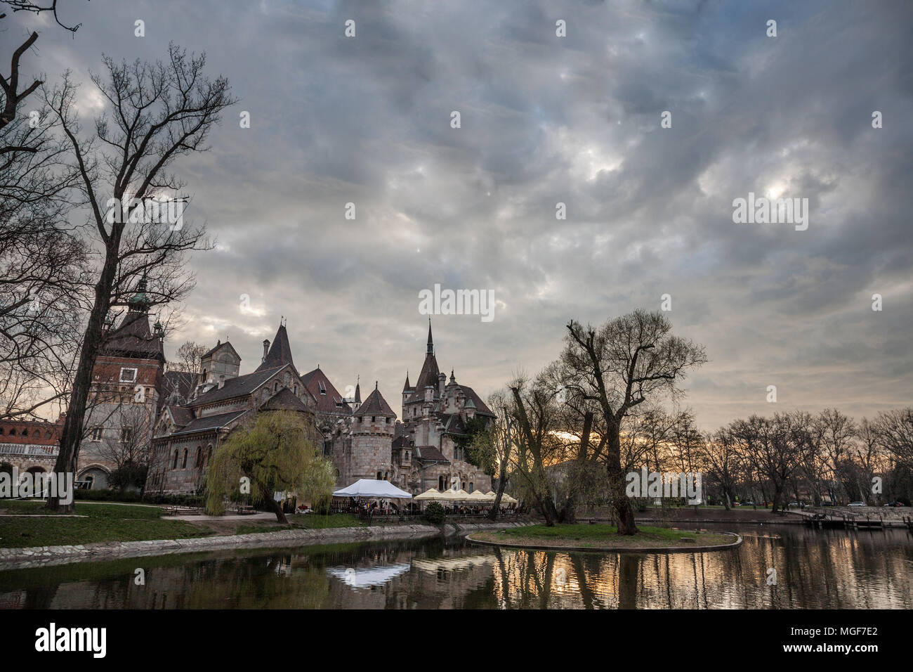 Vajdahunyad Castle in front of a lake in Varosliget Park (the city park) in Budapest, Hungary. Located near Szechenyi bath, it is one of the main monu Stock Photo