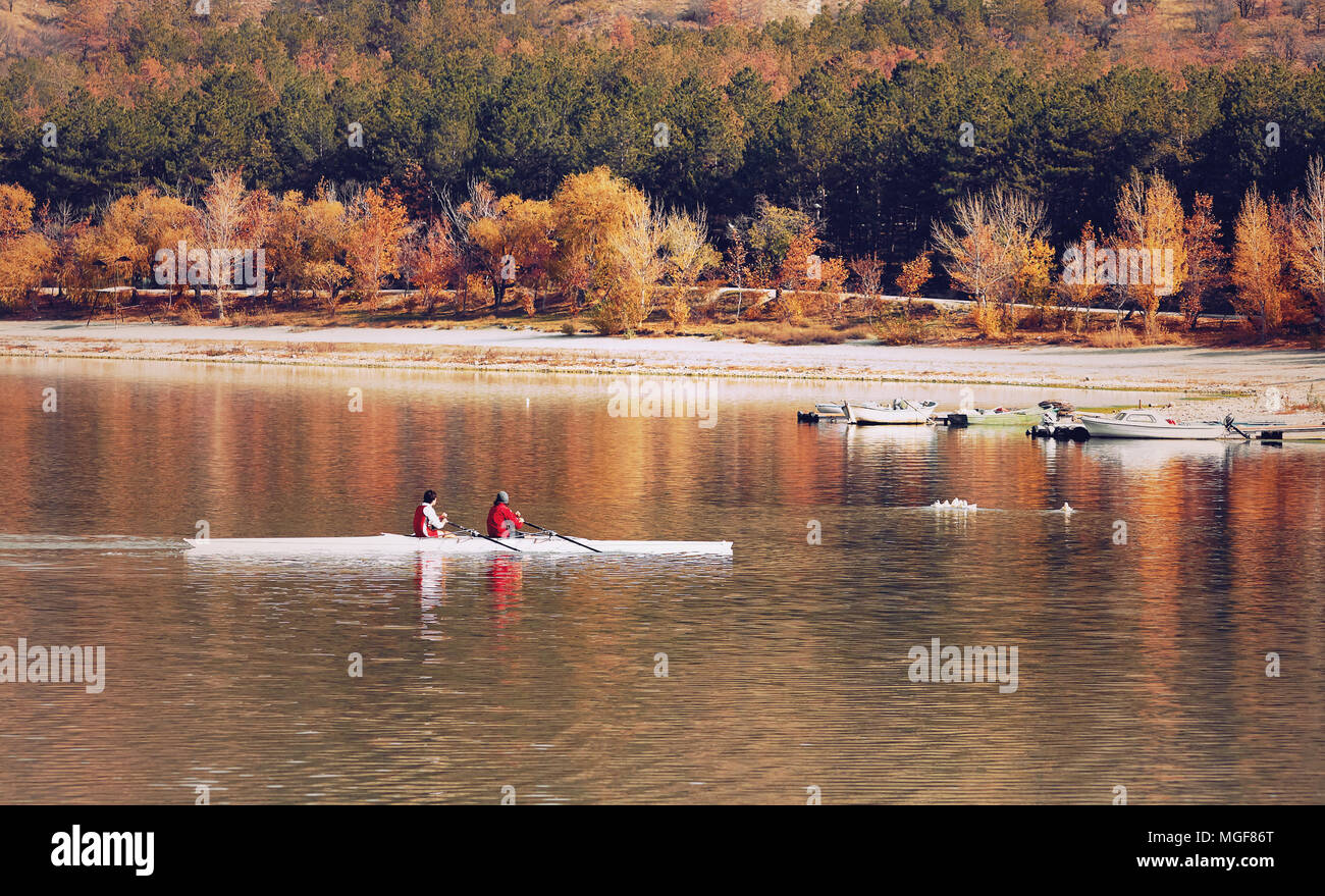 Men swimming in lake in boats hi-res stock photography and images - Alamy