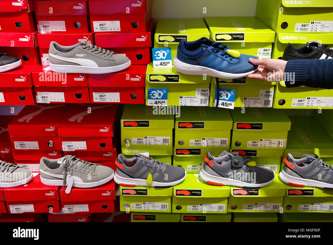 Sport shoes in a footwear store Stock 