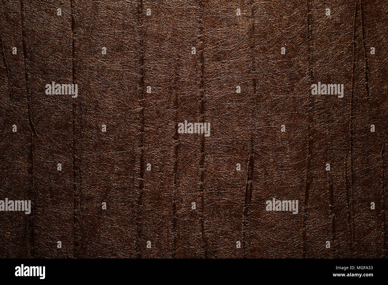 Dark brown textured wallpaper background Stock Photo