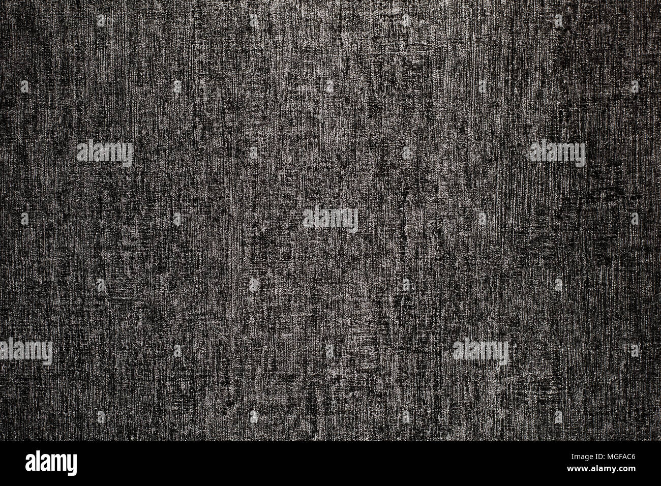 Grizzled and textured dark gray wallpaper background Stock Photo - Alamy