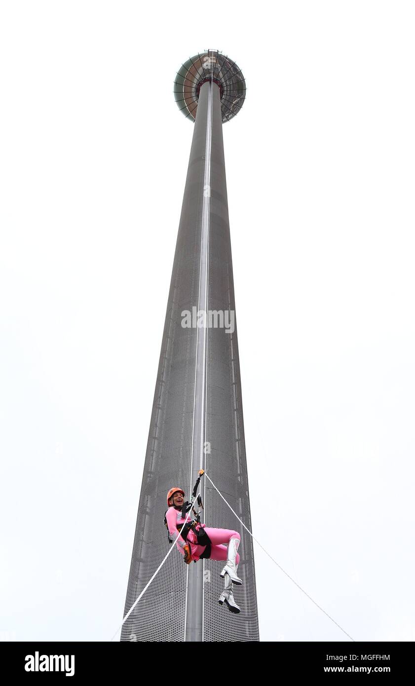 Brighton, Sussex UK 28th April 2018 -  Participants Abseil 450 feet from Brighton's iconic British Airways i360 observation tower during a Charity Abseil in aid of the children’s charity Rockinghorse the fundraising arm of the Royal Alexandra Children’s Hospital in Brighton. Credit: James Boardman/Alamy Live News Stock Photo