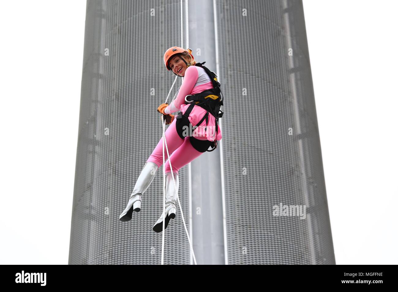 Brighton, Sussex UK 28th April 2018 -  Participants Abseil 450 feet from Brighton's iconic British Airways i360 observation tower during a Charity Abseil in aid of the children’s charity Rockinghorse the fundraising arm of the Royal Alexandra Children’s Hospital in Brighton. Credit: James Boardman/Alamy Live News Stock Photo