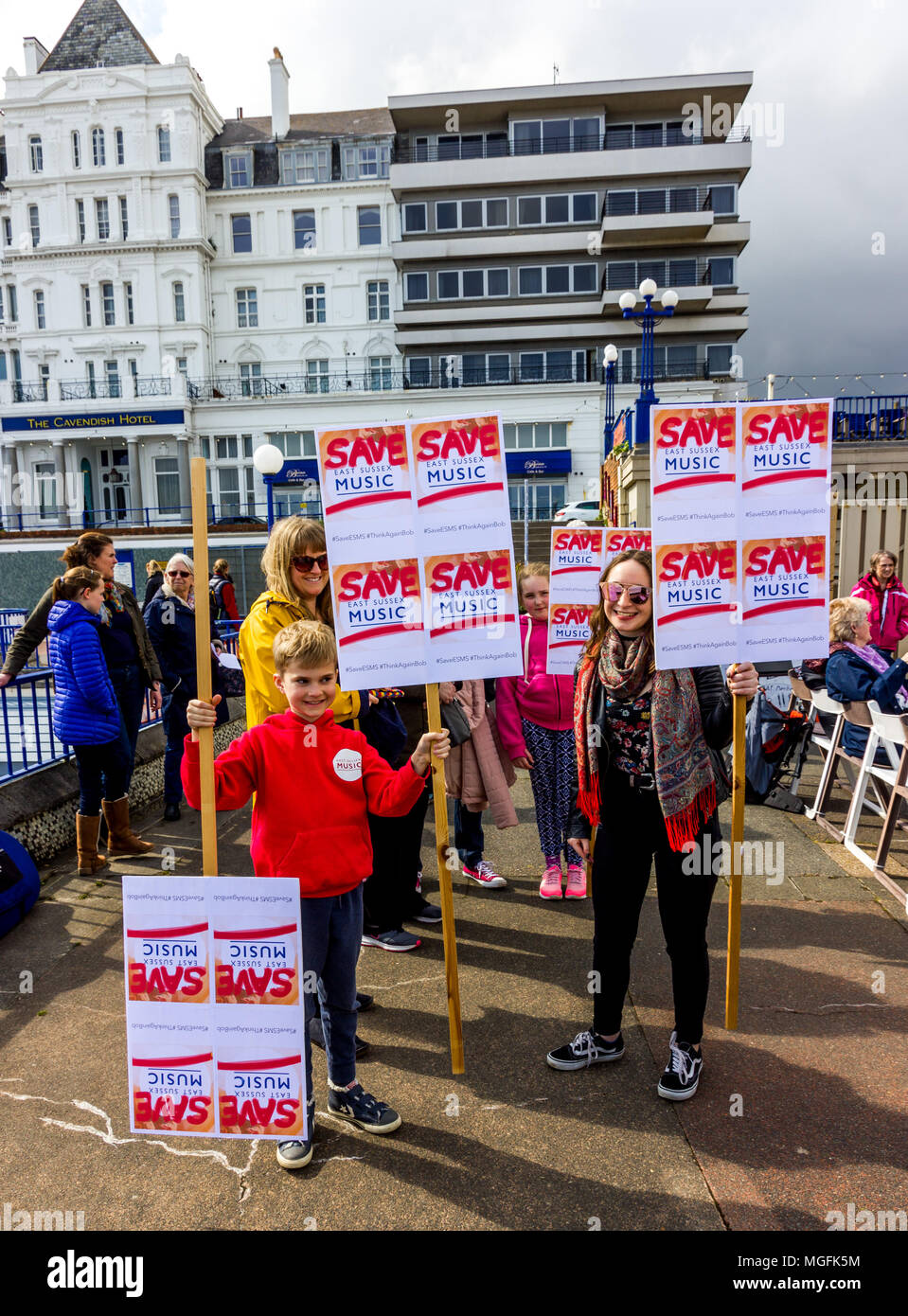 Eastbourne, East Sussex, UK. 28th April 2018. 4pm Saturday afternoon and parents gather at the Eastbourne Bandstand as part of their campaign against East Sussex County Councils decision to close the East Sussex Musical Instrument Service. The service, which is due to end in 2019 as part of the Councils budget cuts, provides 7000 children across the region with music lessons every year. Local Liberal Democrat MP Stephen Lloyd has said, “We need county hall to pause and listen to the people they serve”. Credit: Alan Fraser/Alamy Live News Stock Photo