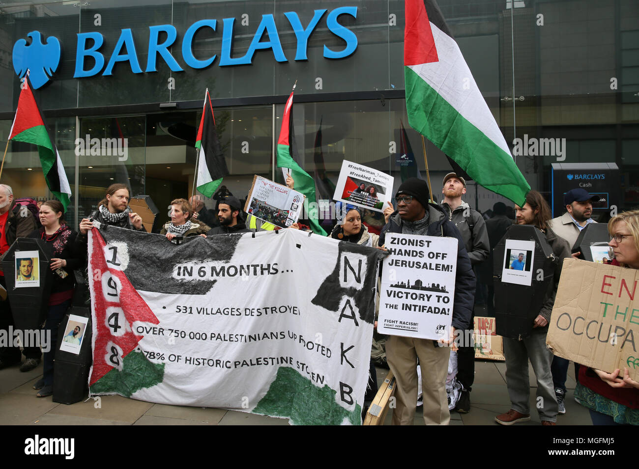 Manchester, UK, 28 April 2018. Pro Palestinian protesters gather outside Barclays Bank in protest against companies that they say supply arms to Israel and also provides arms companies with the loans they need to operate.  They are calling for an end to what they say is complicity with Israeli war crimes,, Manchester , 28th April, 2018 (C)Barbara Cook/Alamy Live News Stock Photo