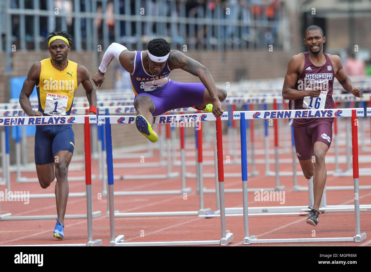 Philadelphia, Pennsylvania, USA. 27th Apr, 2018. ROHAN COLE (1), SIDNEY GIBBONS (8), and HERBERT WISE III (16) compete in the College Men's Shuttle Hurdles 4x110m at Franklin Field in Philadelphia, Pennsylvania. Credit: Amy Sanderson/ZUMA Wire/Alamy Live News Stock Photo