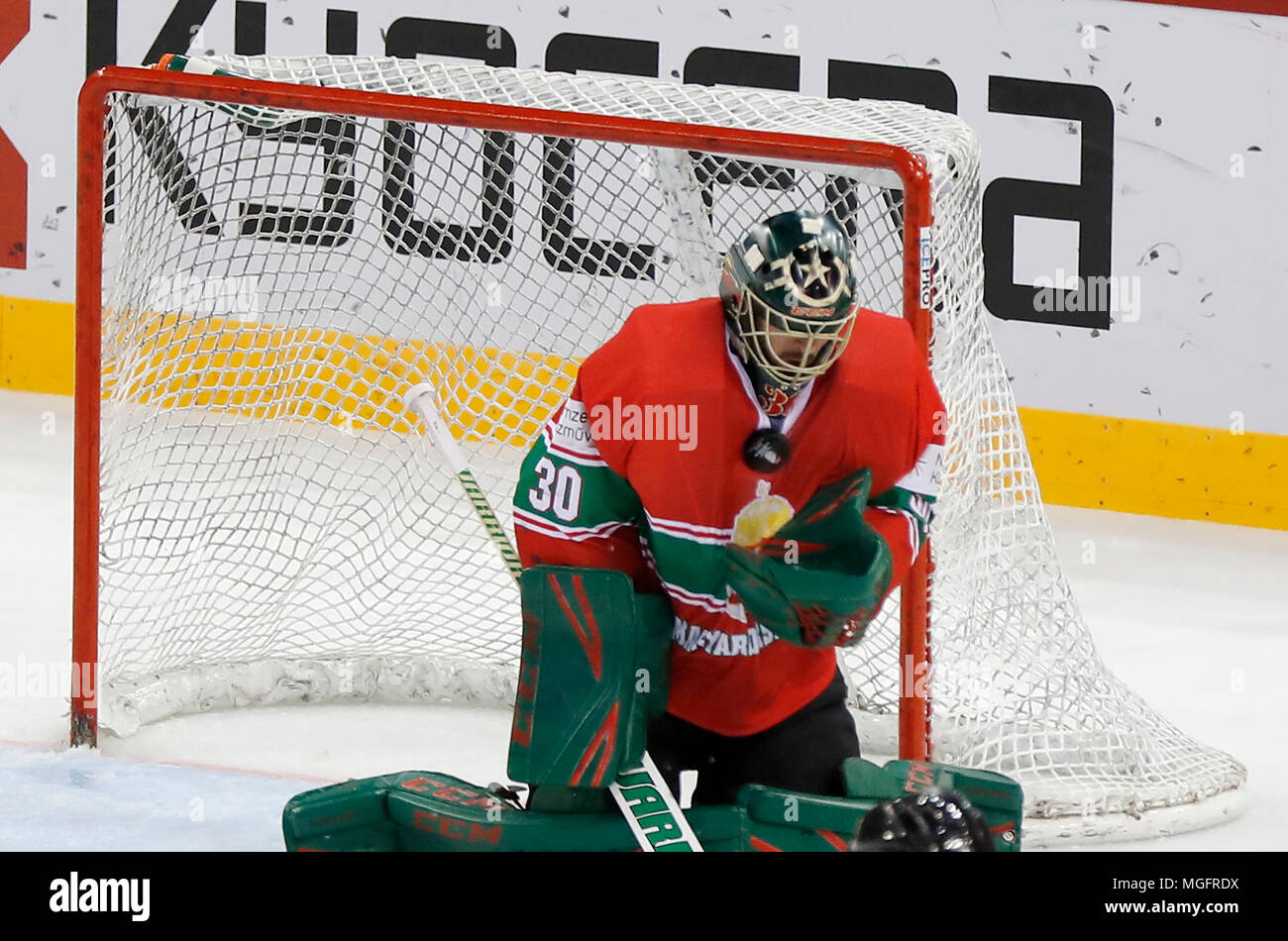 Budapest, Hungary. 28 April 2018. Goalie Adam Vay of Hungary saves with his chest during the 2018 IIHF Ice Hockey World Championship Division I Group A match between Hungary and Great Britain at Laszlo Papp Budapest Sports Arena on April 28, 2018 in Budapest, Hungary. Credit: Laszlo Szirtesi/Alamy Live News Stock Photo