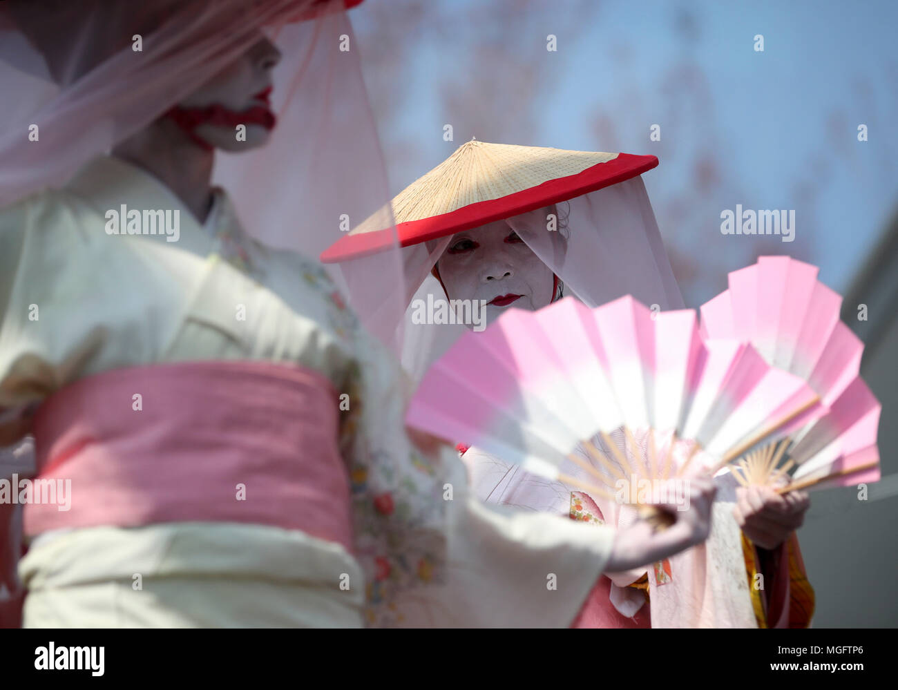 New York, USA. 28th Apr, 2018. Dancers perform in Brooklyn Botanic Garden in New York, the United States, on April 28, 2018. The annual cherry blossom festival is held here on Saturday and Sunday, attracting thousands of people to enjoy cherry blossoms during the weekend. Credit: Wang Ying/Xinhua/Alamy Live News Stock Photo