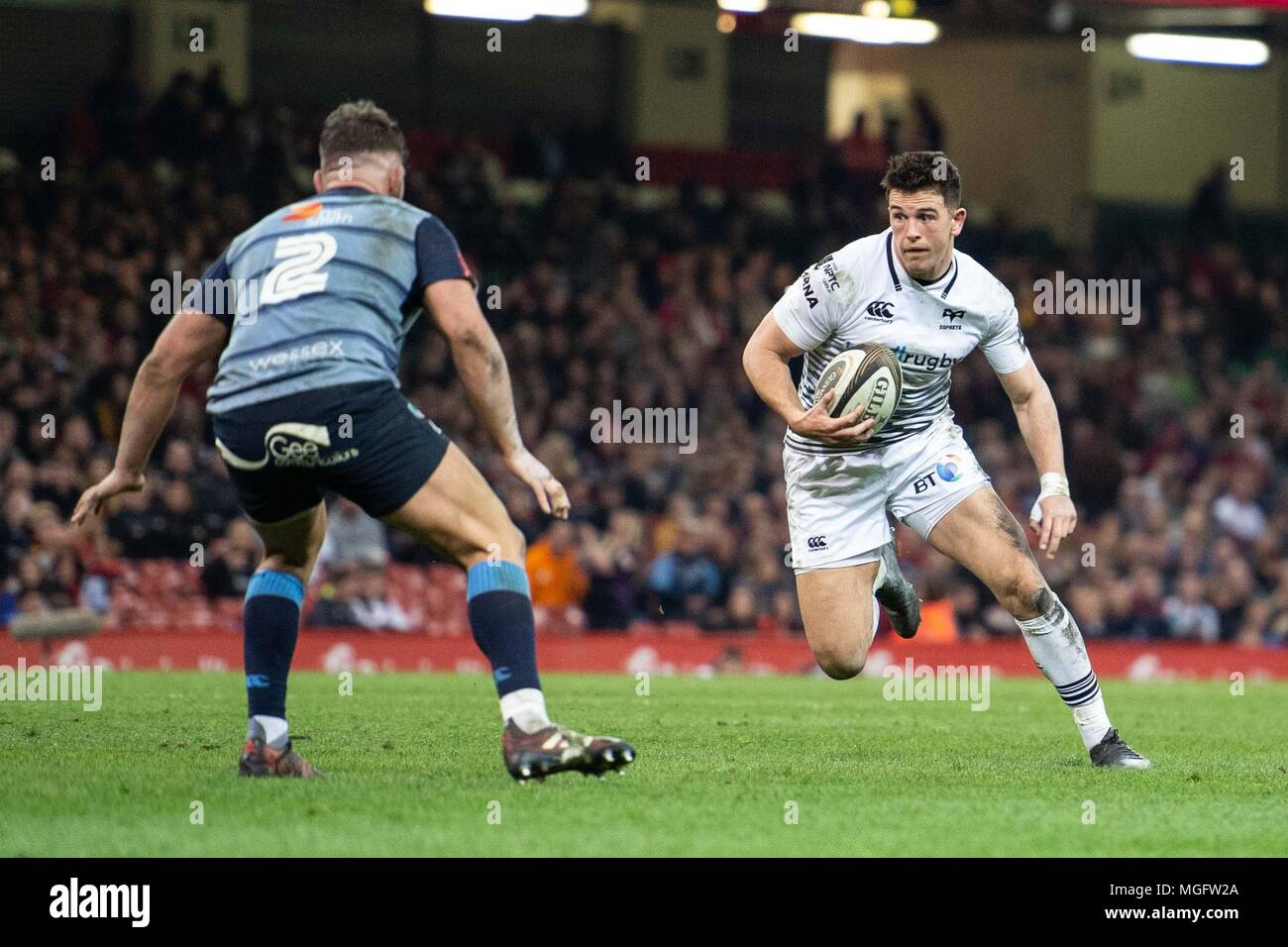 Cardiff, UK. 28 April 2018. Ospreys' Owen Watkin steps and attacks Cardiff, UK. 28 April 2018. Cardiff Blues'  Kirby Myhill. Guinness Pro14 rugby match, Cardiff Blues v Ospreys , match two of Judgement Day at the Principality Stadium in Cardiff, South Wales on Saturday 28th April 2018. pic by Simon Latham, Andrew Orchard sports photography/Alamy live news Stock Photo