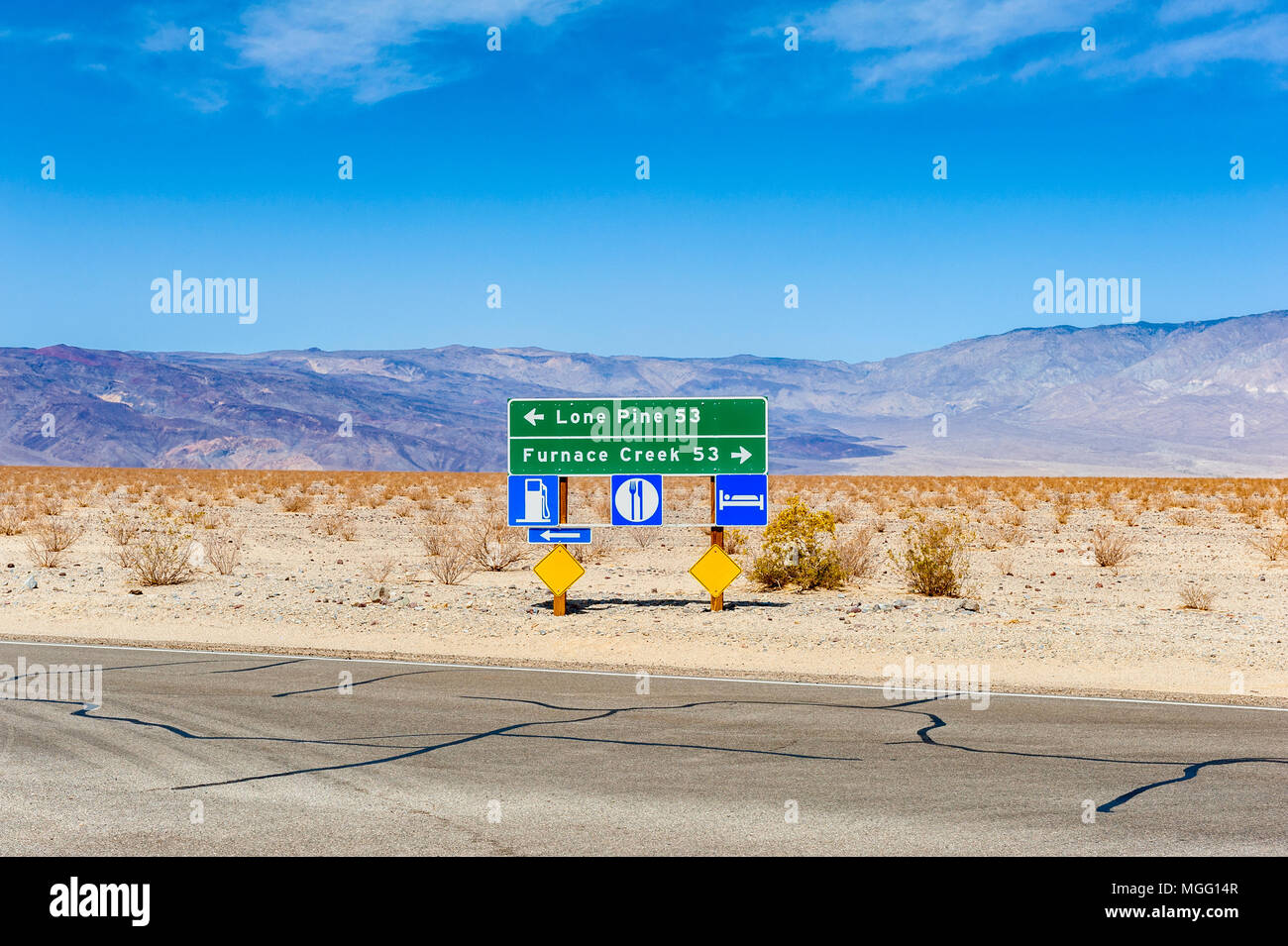 Directional Signs to Lone Pine and Furnace Creek in Death Valley, California, USA Stock Photo