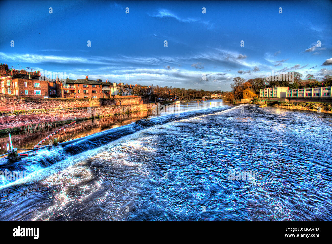 City of Chester, England. Artistic view of the River Dee, with Chester Walls on the left of the image and the Groves in the background. Stock Photo