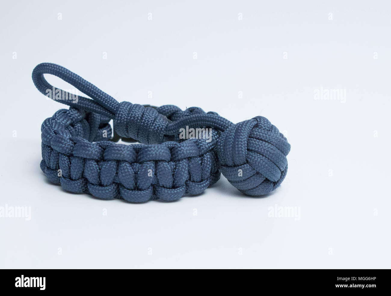 Paracord cobra knot bracelet wristlet with monkey fist Stock Photo - Alamy