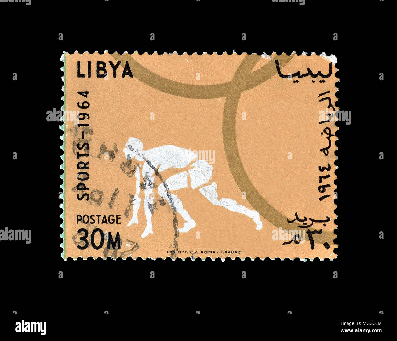 Cancelled postage stamp printed by Libya, that promotes athletics, circa 1964. Stock Photo