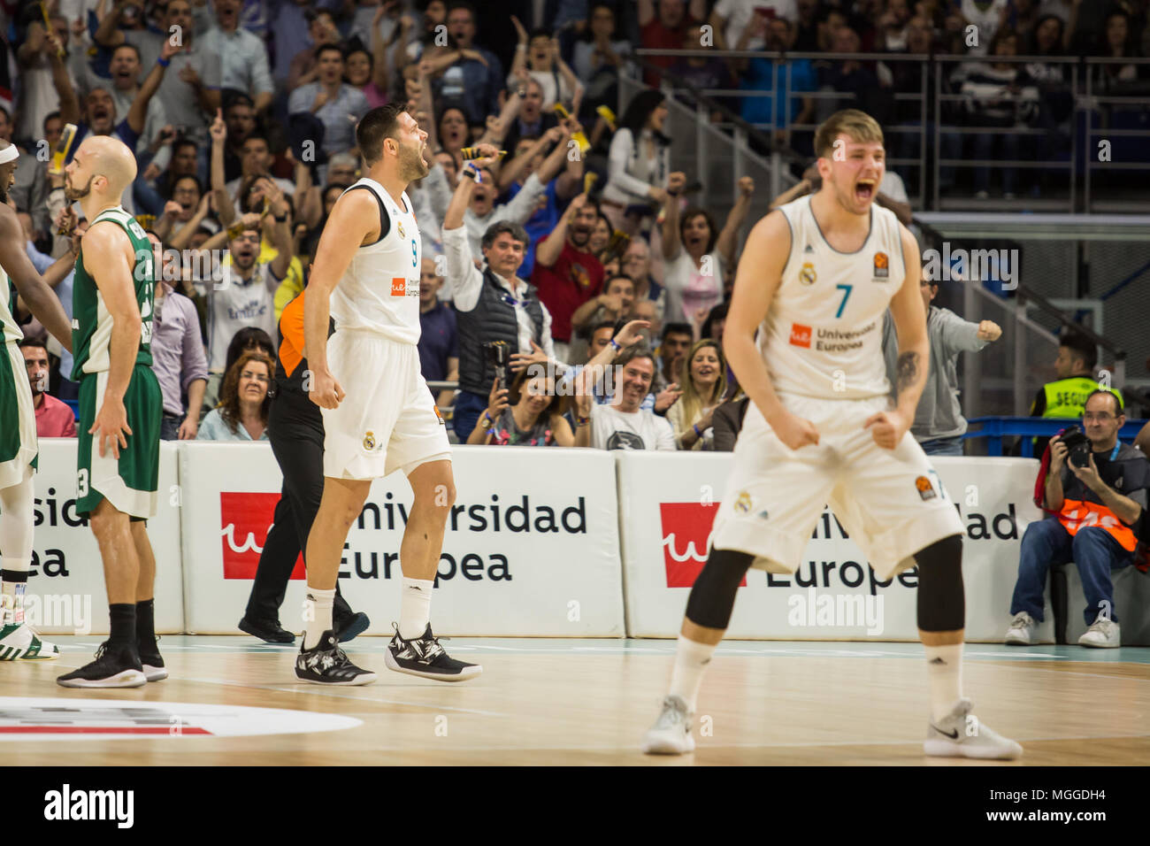 Madrid, Spain. 27th Apr, 2018. Luka Doncic (R) and Felipe Reyes (L) during Real Madrid victory over Panathinaikos Athens (89 - 82) in Turkish Airlines Euroleague playoff series (game 4) celebrated at Wizink Center in Madrid (Spain). April 27th 2018. Credit: Juan Carlos García Mate/Pacific Press/Alamy Live News Stock Photo