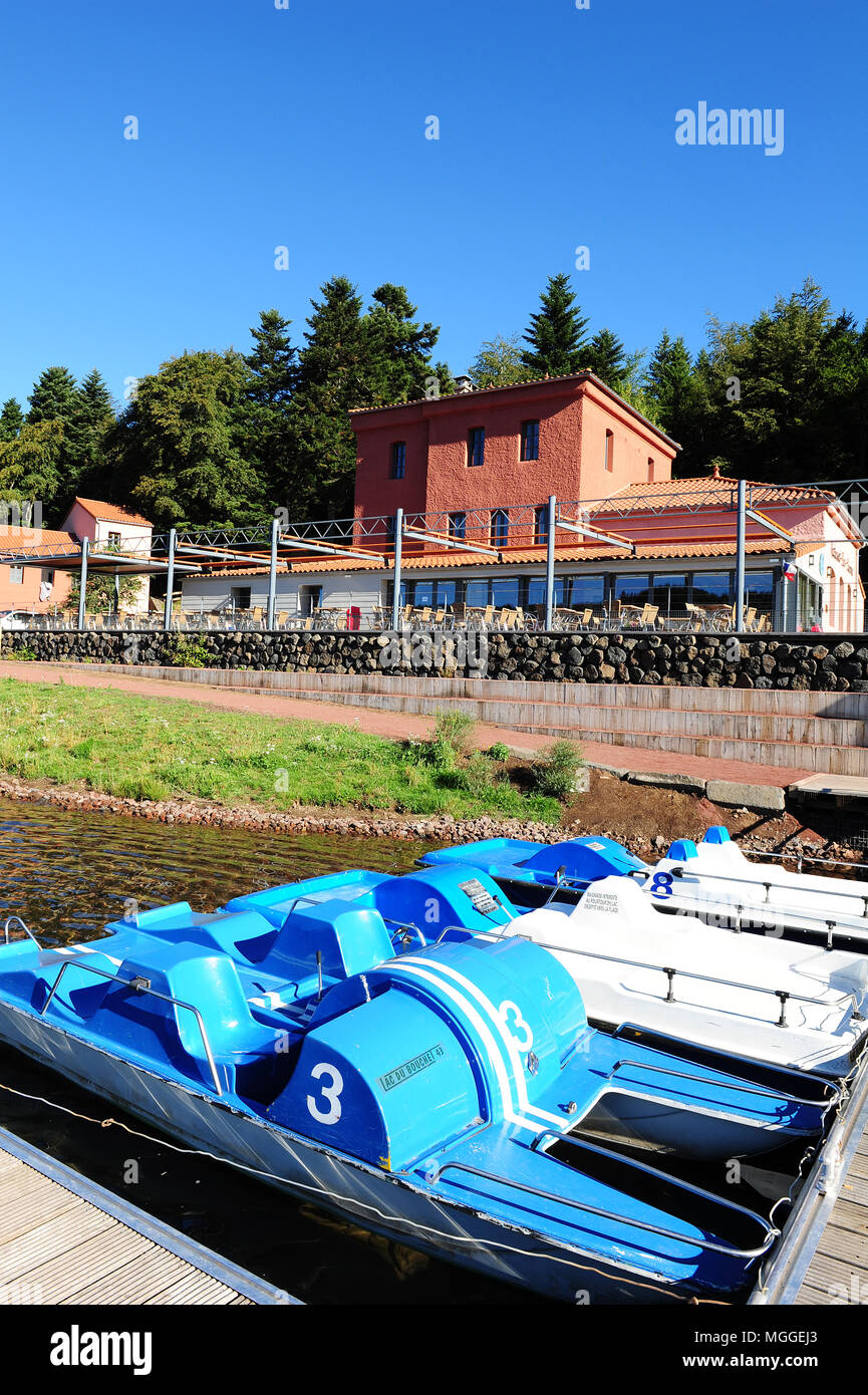 Paddle boats on Lac du Bouchet, in the French region of Le Puy, Haute