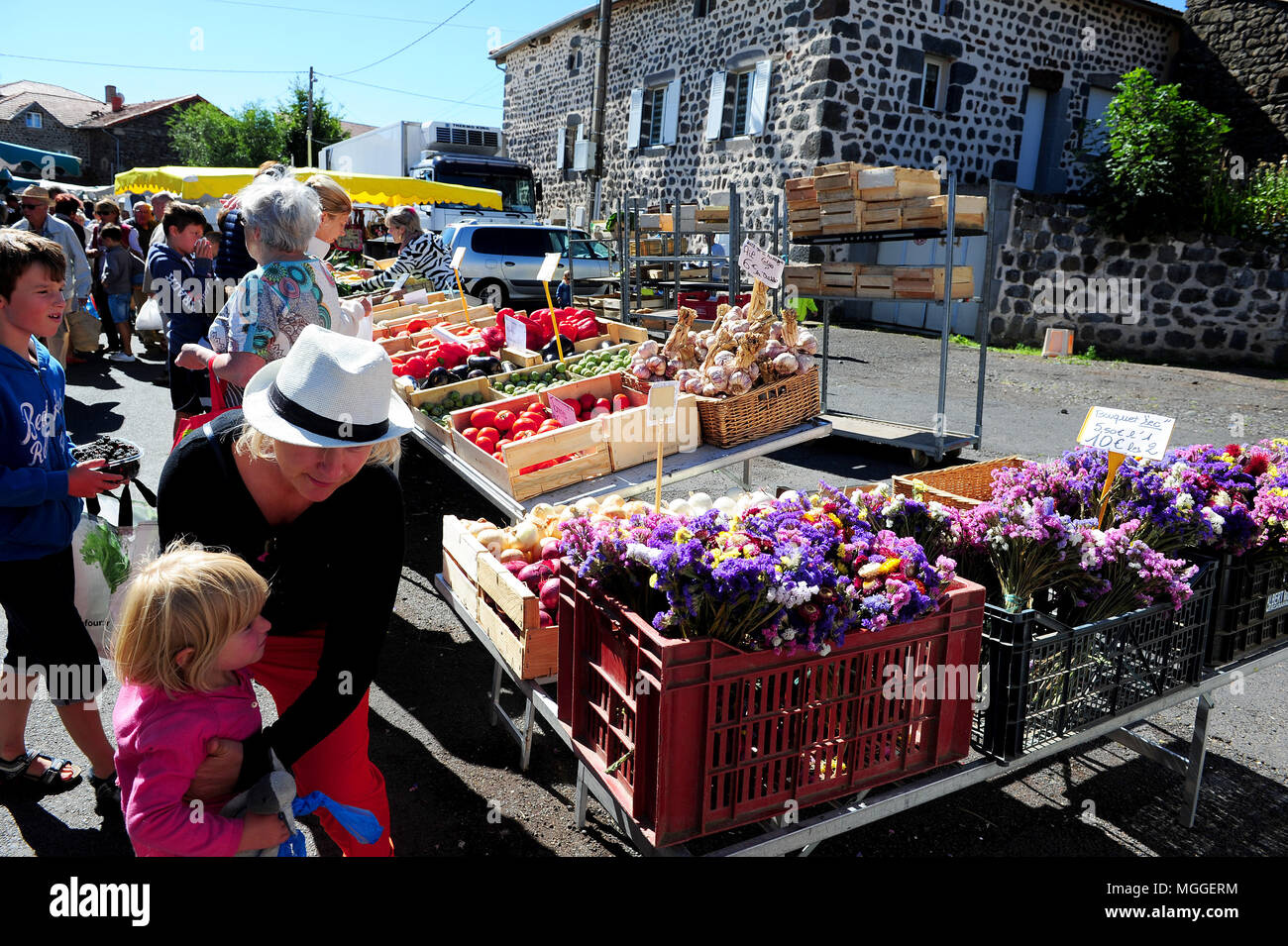 Haute-Loire, France - The weekly market of Costaros - one of the largest ones in the Le Puy region - offers local and organic products. Stock Photo