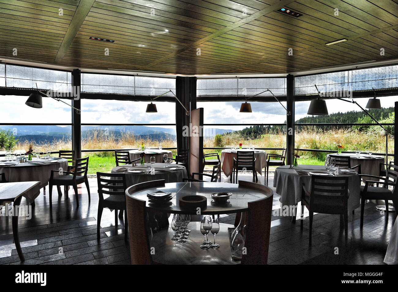 Fine dining with a view over the Auvergne countryside at Michelin three-starred Régis et Jacques Marcon restaurant in Saint-Bonnet-le-Froid, France Stock Photo