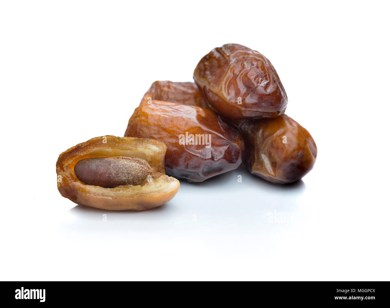 Ramadan Dried Dates with Kernel Isoalted on White Background Stock Photo