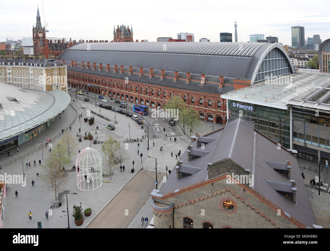High level view of St Pancras Station, London. Shows old station (centre) new extension (right) & new Kings Cross concourse and piazza (centre & left) Stock Photo