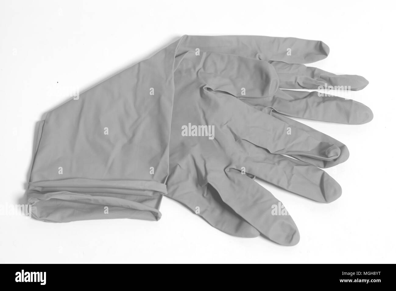 Gray latex gloves isolated on a white background Stock Photo