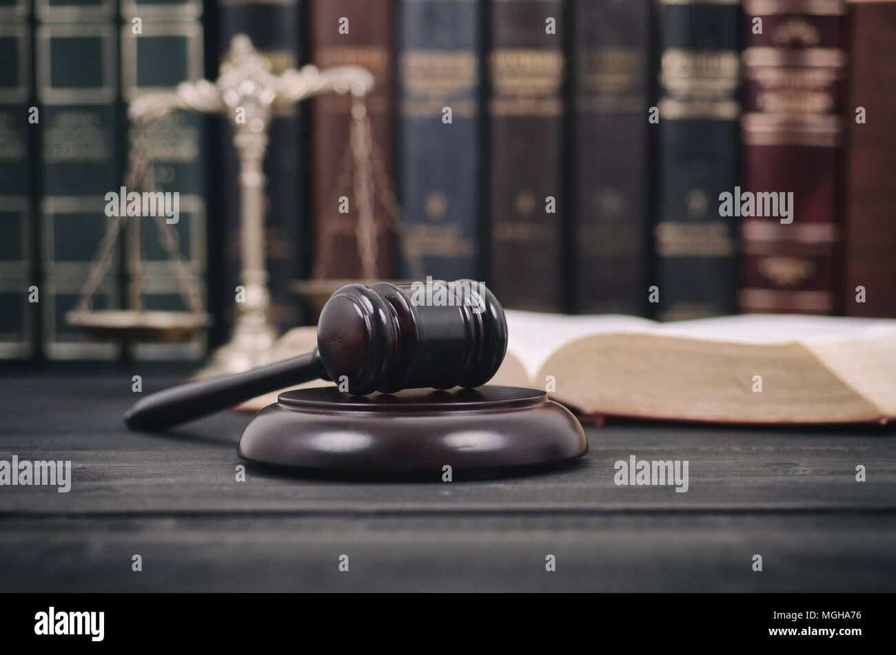 Law and Justice, Legality concept, Scales of Justice and Judge Gavel on a black wooden background. Stock Photo