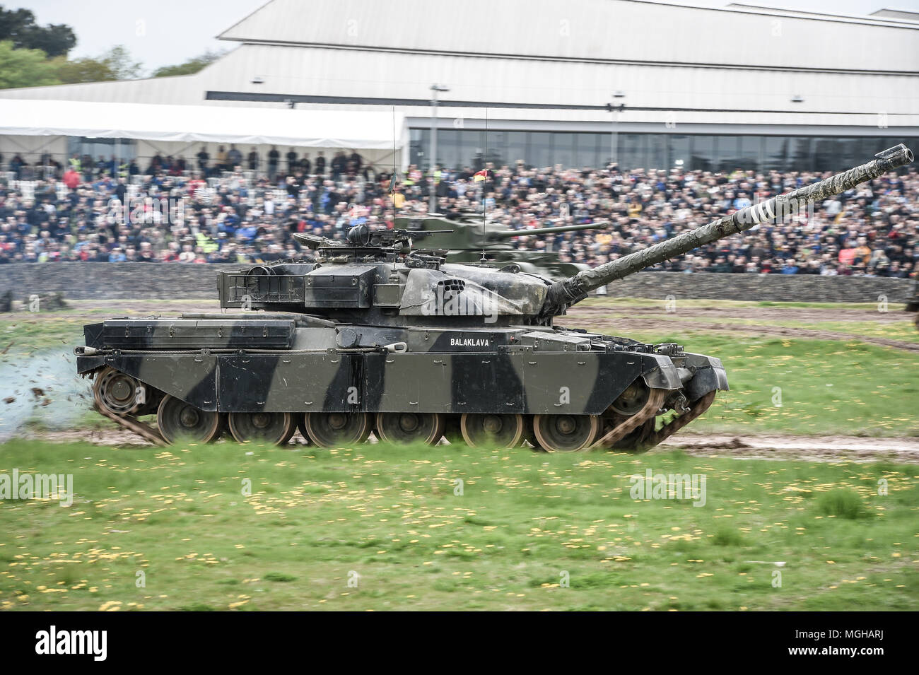 An FV4201 Chieftain main battle tank of the United Kingdom during the 1960s, 1970s and 1980s, drives around the tank course at the Tank Museum in Bovington, Dorset, as the attraction hosts Tiger Day to mark the 75th anniversary of the world's only working Tiger Tank's capture in 1943 in the Tunisian desert. Stock Photo