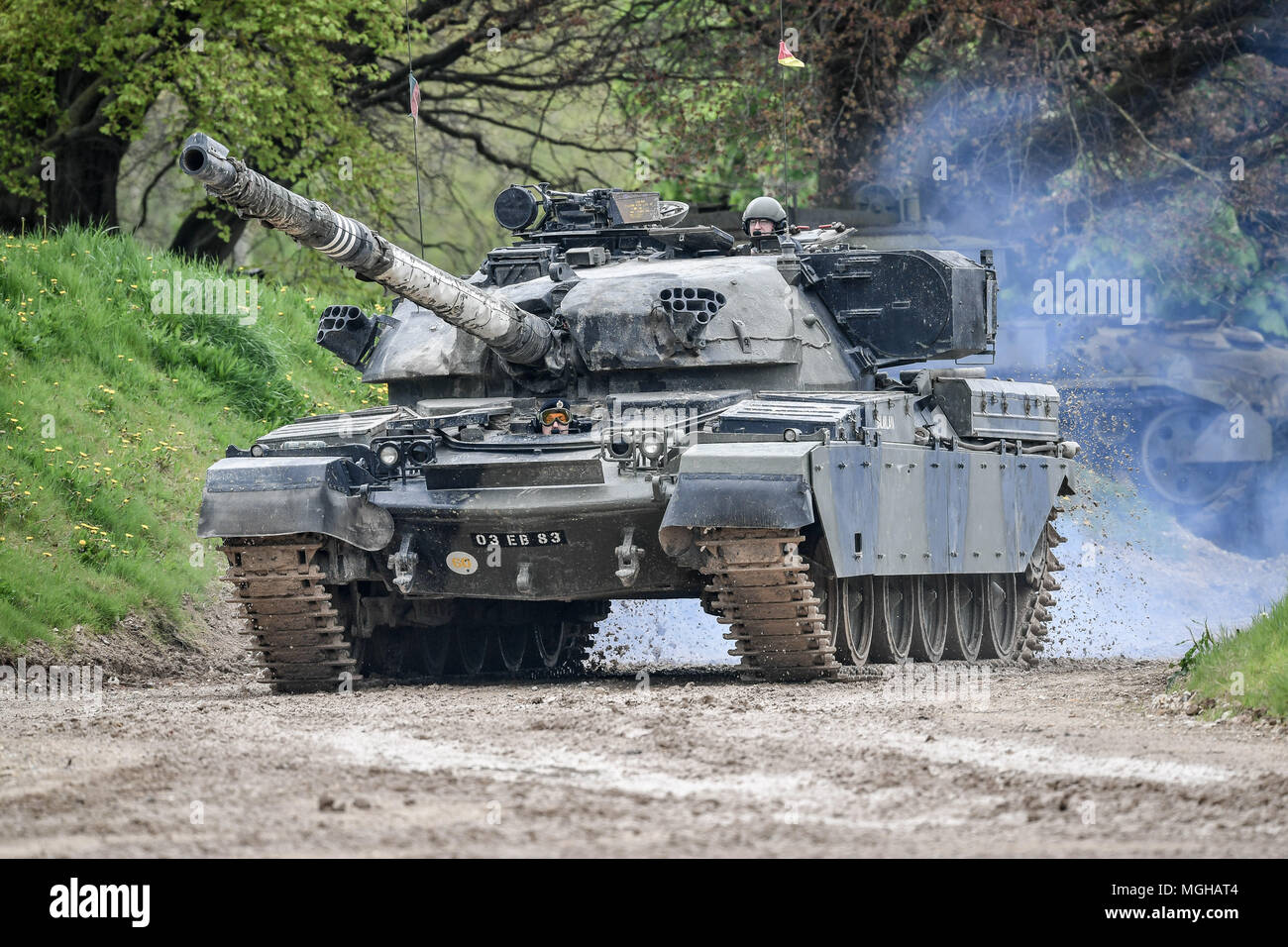 An FV4201 Chieftain main battle tank of the United Kingdom during the 1960s, 1970s and 1980s, drives around the tank course at the Tank Museum in Bovington, Dorset, as the attraction hosts &quot;Tiger Day&quot; to mark the 75th anniversary of the world's only working Tiger Tank's capture in 1943 in the Tunisian desert. Stock Photo