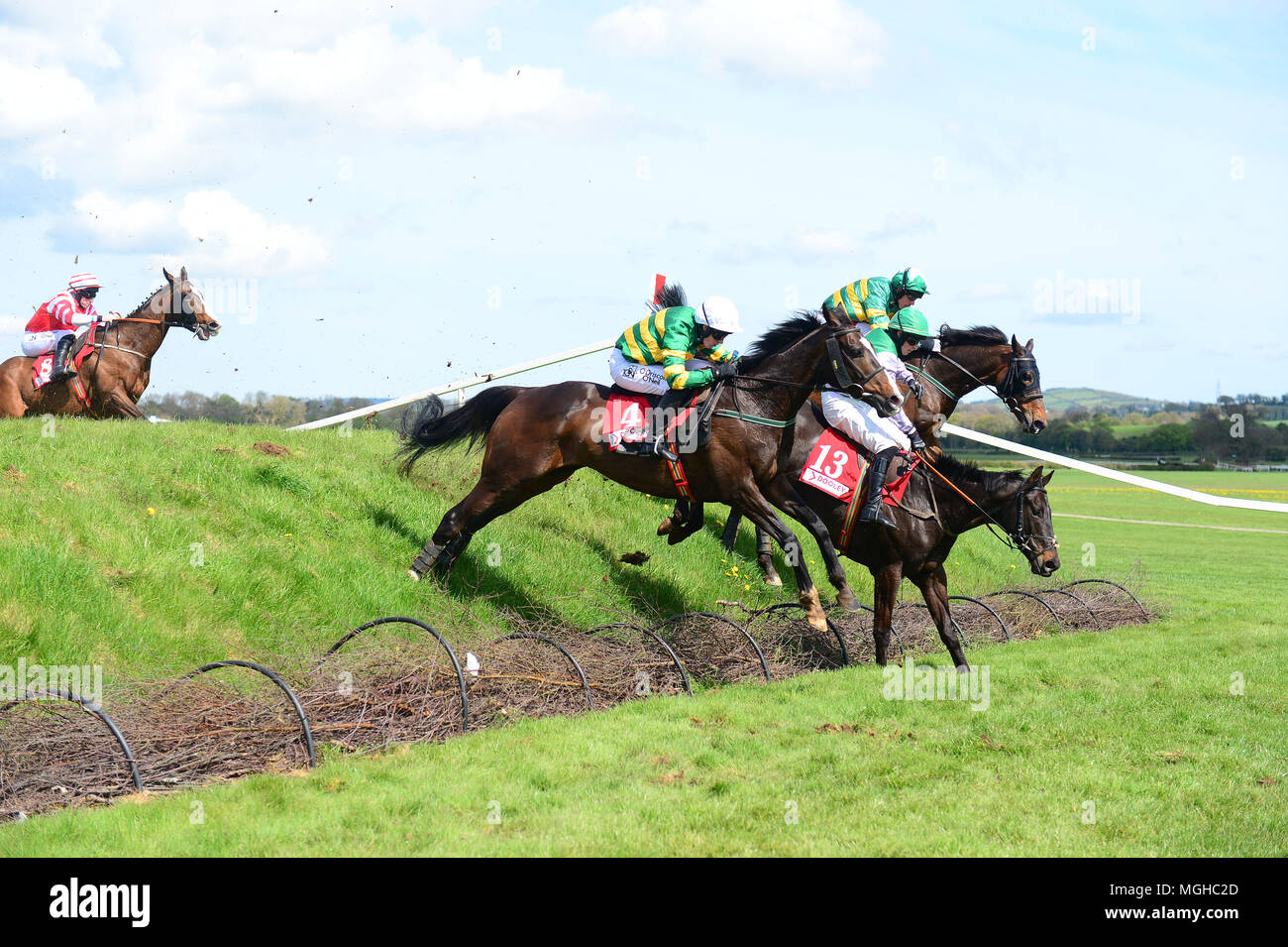 Josies Orders ridden by Nina Carberry (near) jumps the Old Double before winning the Dooley Insurances Cross Country Chase during day five of the Punchestown Festival 2018 at Punchestown Racecourse, County Kildare. Stock Photo