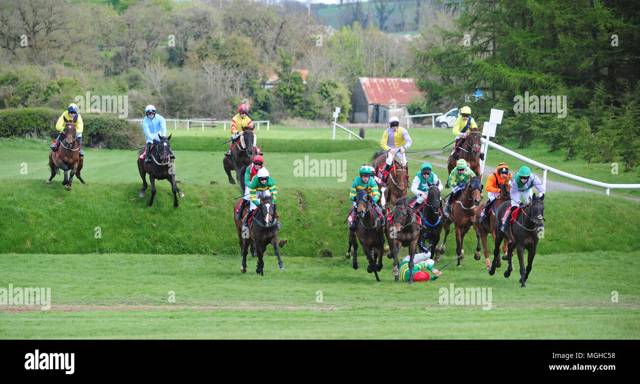 Josies Orders ridden by Nina Carberry (white cap) left jumps the Old Double before winning the Dooley Insurances Cross Country Chase during day five of the Punchestown Festival 2018 at Punchestown Racecourse, County Kildare. Stock Photo