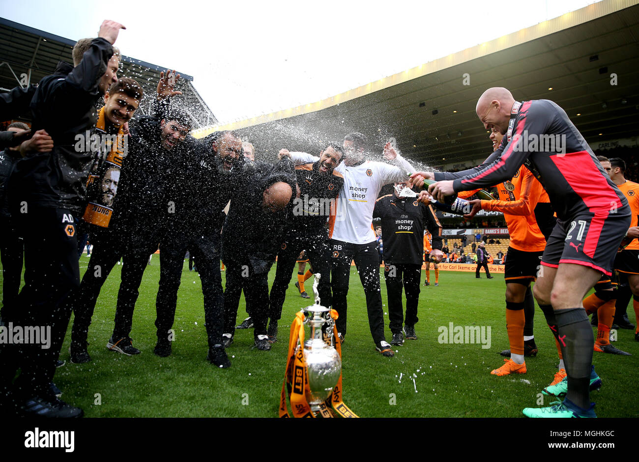 Wolverhampton Wanderers Goalkeeper John Ruddy Right Sprays Wolverhampton Wanderers Manager Nuno Espirito Santo Centre With Champagne Whilst Celebrating After The Sky Bet Championship Match At Molineux Wolverhampton Stock Photo Alamy