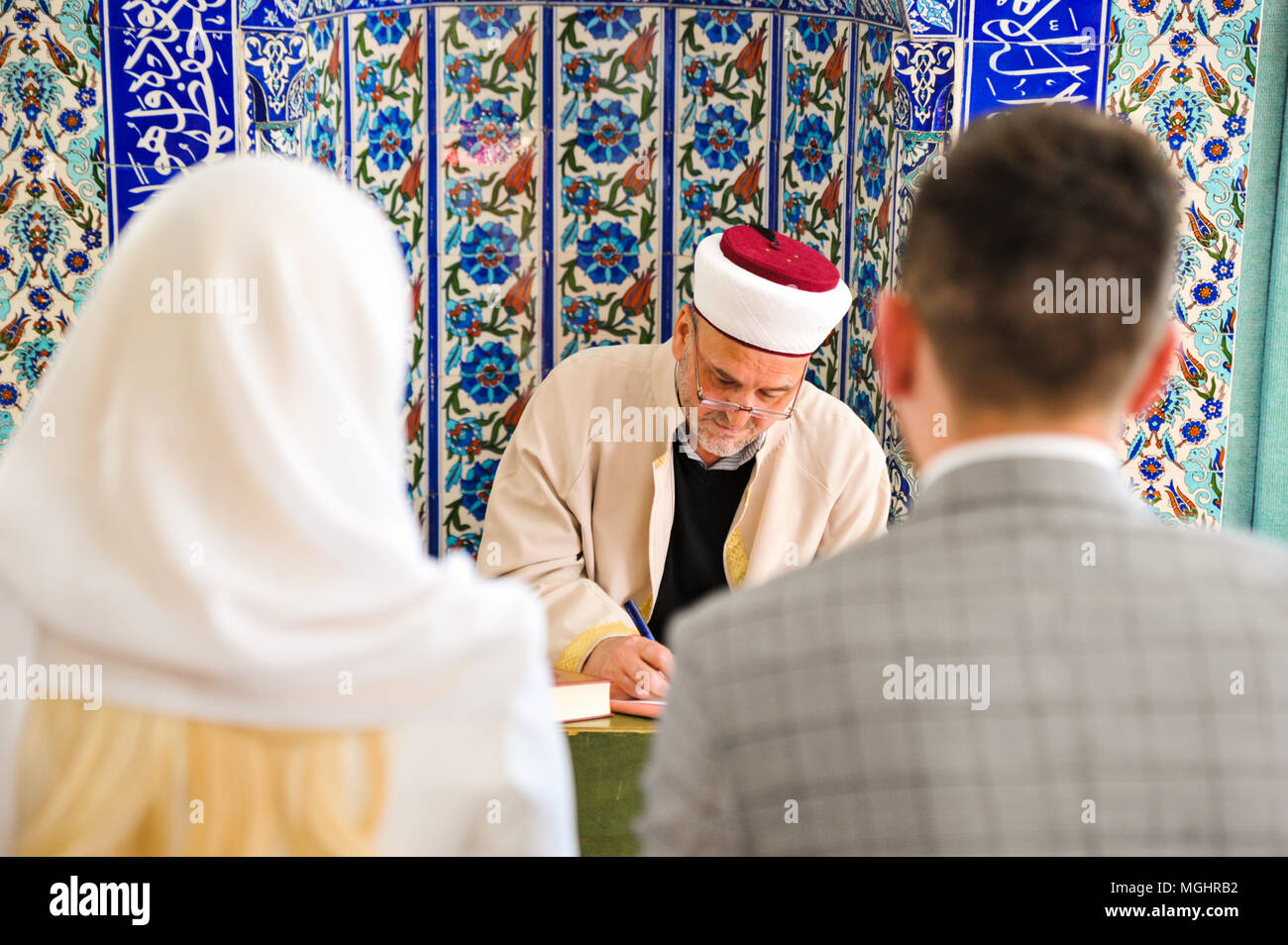 Wedding ceremony in the mosque. Traditional islamic engagement way. Stock Photo