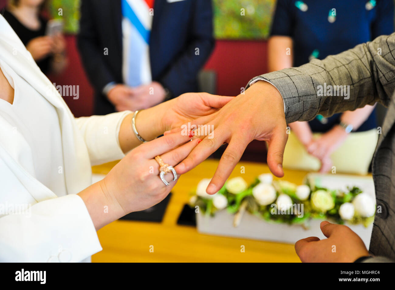 Engagement ring ceremony of a Mauritian Hindu couple. Groom passing ring in  his bride`s finger, Mauritius, Africa Stock Photo - Alamy