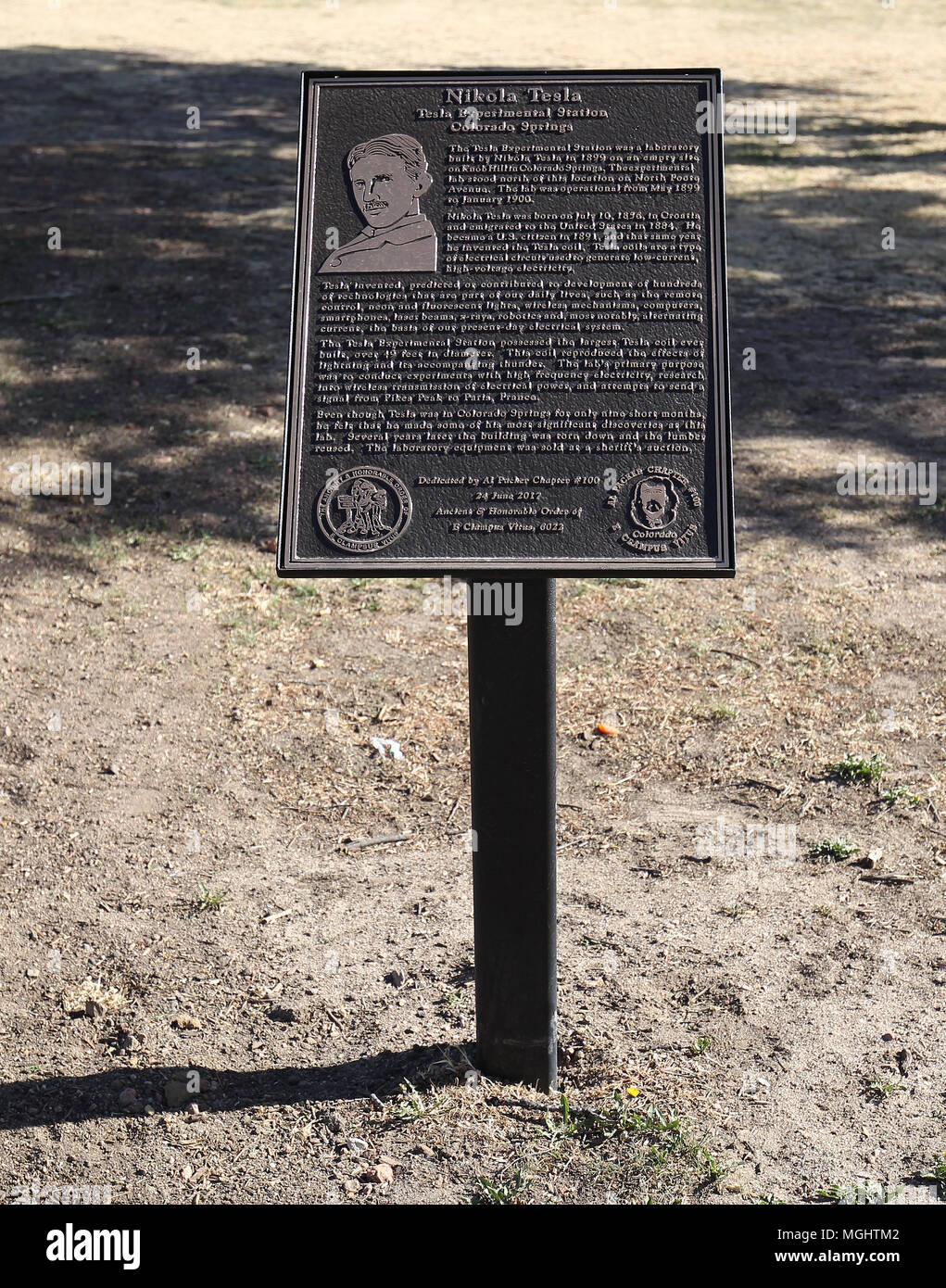 Nikola Tesla bronze historical marker on the south side of Pike's Peak