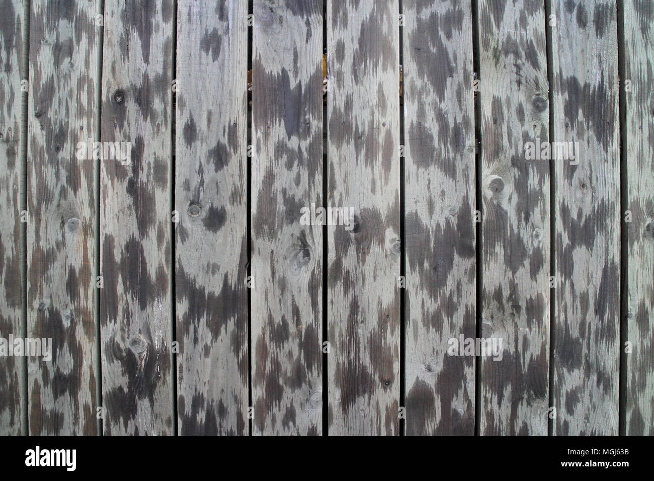 old gray wooden plank fence Stock Photo