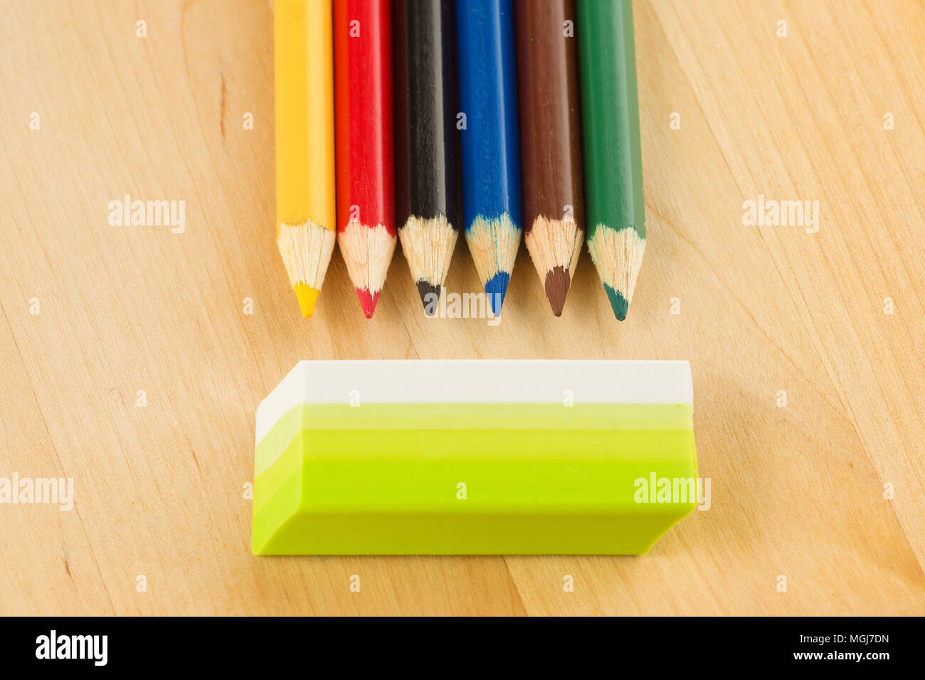 many sharp sharpened colored pencils close-up on the background Stock Photo