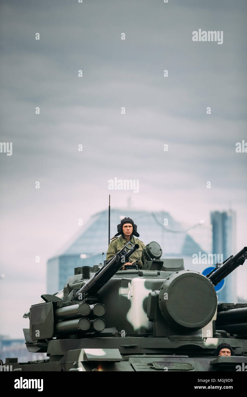 Minsk, Belarus. 2K22 Tunguska Russian Tracked Self-propelled Anti-aircraft Weapon Moving Near National Library During Rehearsal Before Celebration Of  Stock Photo