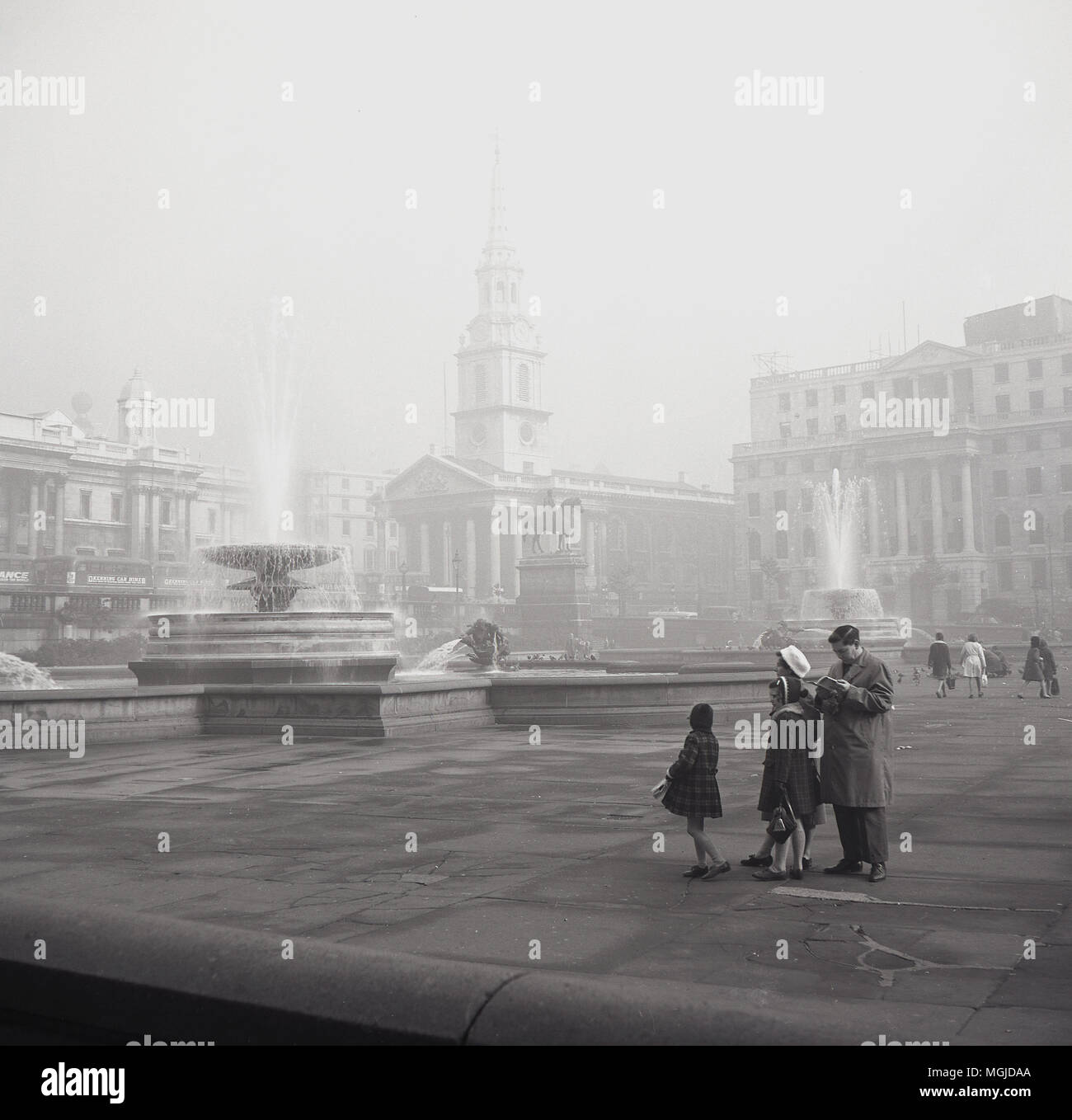1950s, historical, family visiting a quiet Trafalgar Square, London, England, UK. Stock Photo